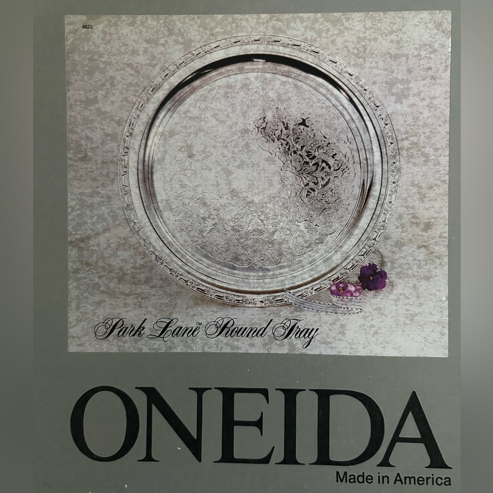 Circular silver plate tray, 14.5 diameter, by Oneida. Level up your party plan!